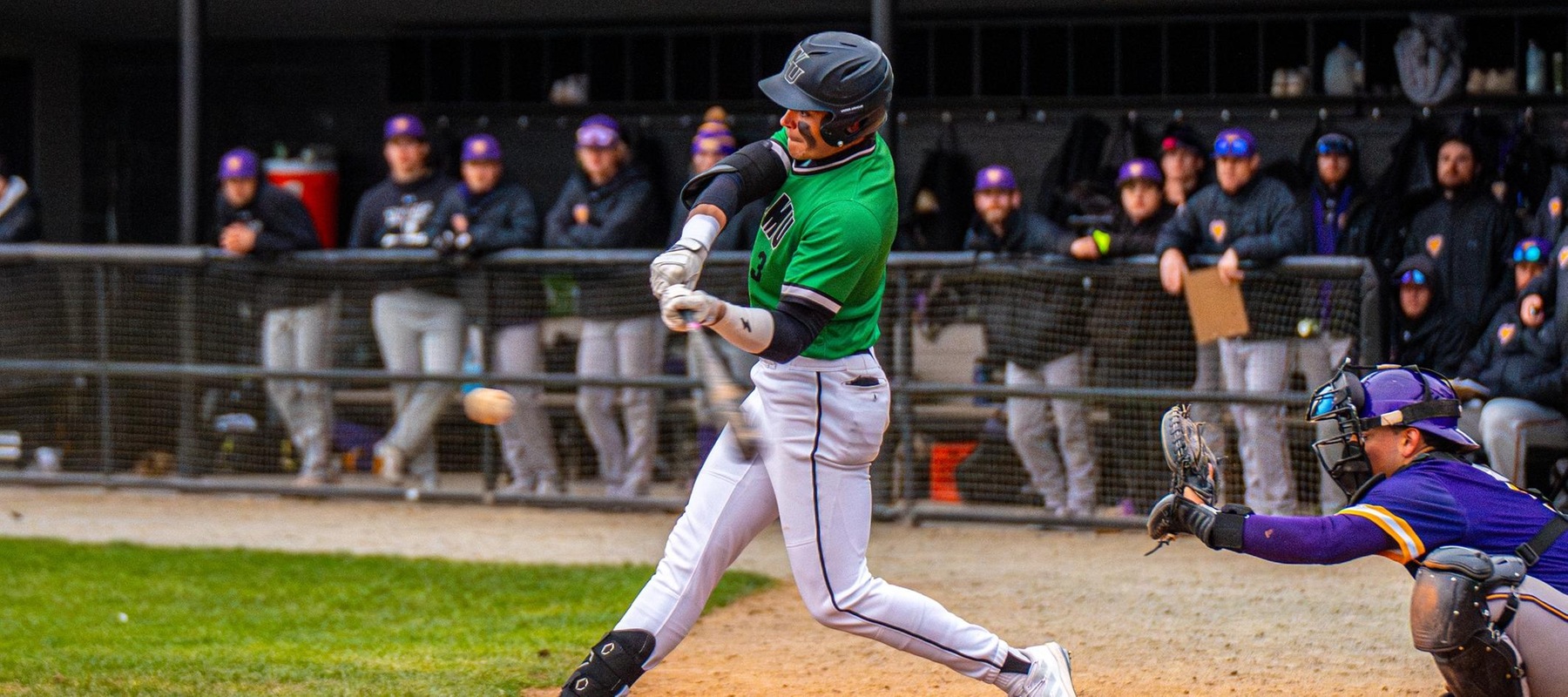 Photo of Cam Trego's 2-run single back up the middle in the 8th inning to tie the game, 7-7. Copyright 2024; Wilmington University. All rights reserved. Photo by Giovanni Badalamenti. March 19 vs. West Chester at Wilson Field.