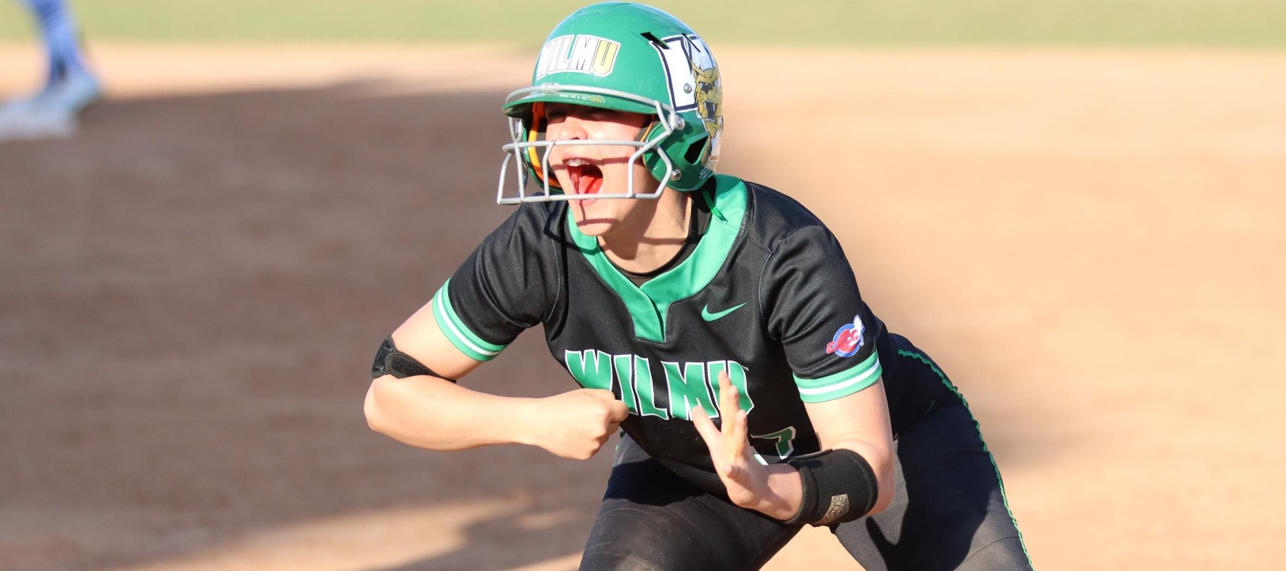 Photo following Tristyn Stewart's RBI single in the 8th inning of game one at Embry-Riddle. Copyright 2023; Wilmington University. all rights reserved. Photo by Erin Harvey. February 28, 2023 at Embry-Riddle