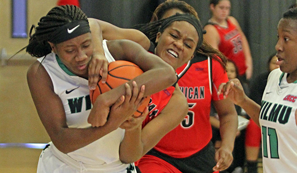 Copyright 2016; Wilmington University. All rights reserved. Photo of Jamiere Jefferies battling for one of her 15 rebounds against Dominican, taken by Frank Stallworth.
