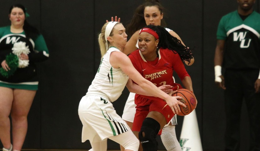 Copyright 2018; Wilmington University. All rights reserved. Photo of Emma Matthews (left) and Macy Robinson (rear) against Chestnut Hill, taken by Frank Stallworth. February 13, 2018 vs. Chestnut Hill