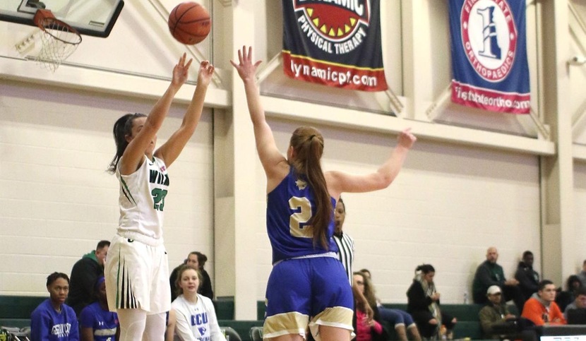 Copyright 2018; Wilmington University. All rights reserved. Photo of Macy Robinson hitting one of her six three-pointers against Georgian Court, by Frank Stallworth. January 6, 2018 vs. Georgian Court.