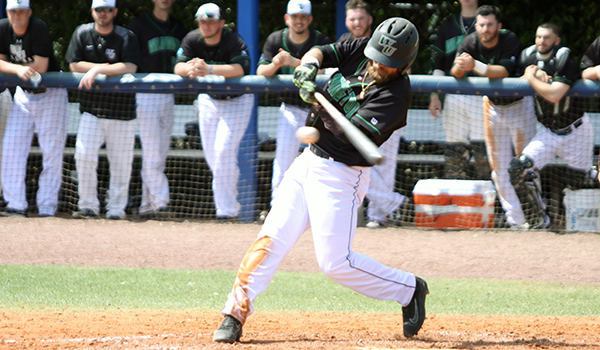 Copyright 2017; Wilmington University. All rights reserved. Photo of Julian Kurych's RBI single in the fourth inning of game one on Monday.