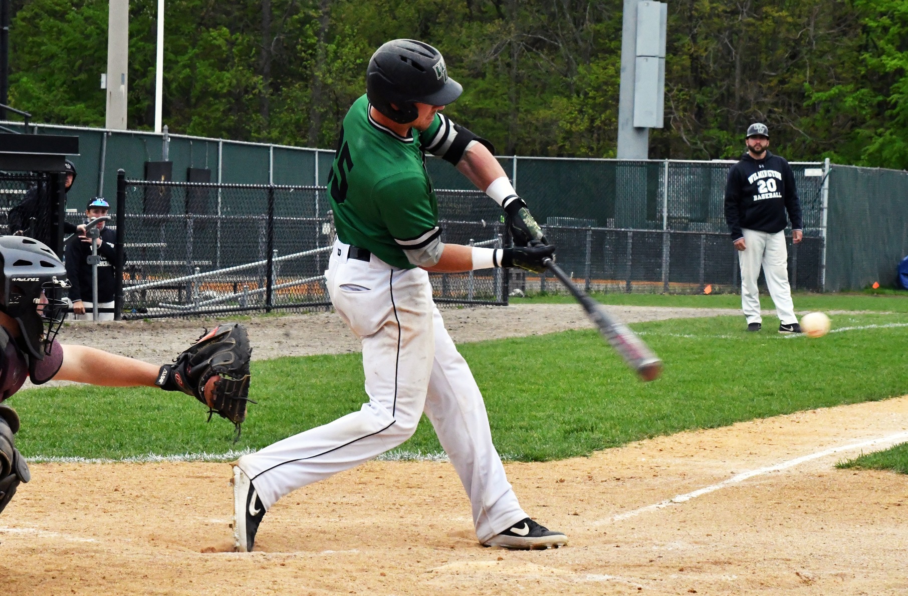 Copyright 2019; Wilmington University. All rights reserved. Photo of Luke Johnson who hit the go-ahead three-run homer in the seventh against Dominican. Taken by Ellen O'Brien, CACC.