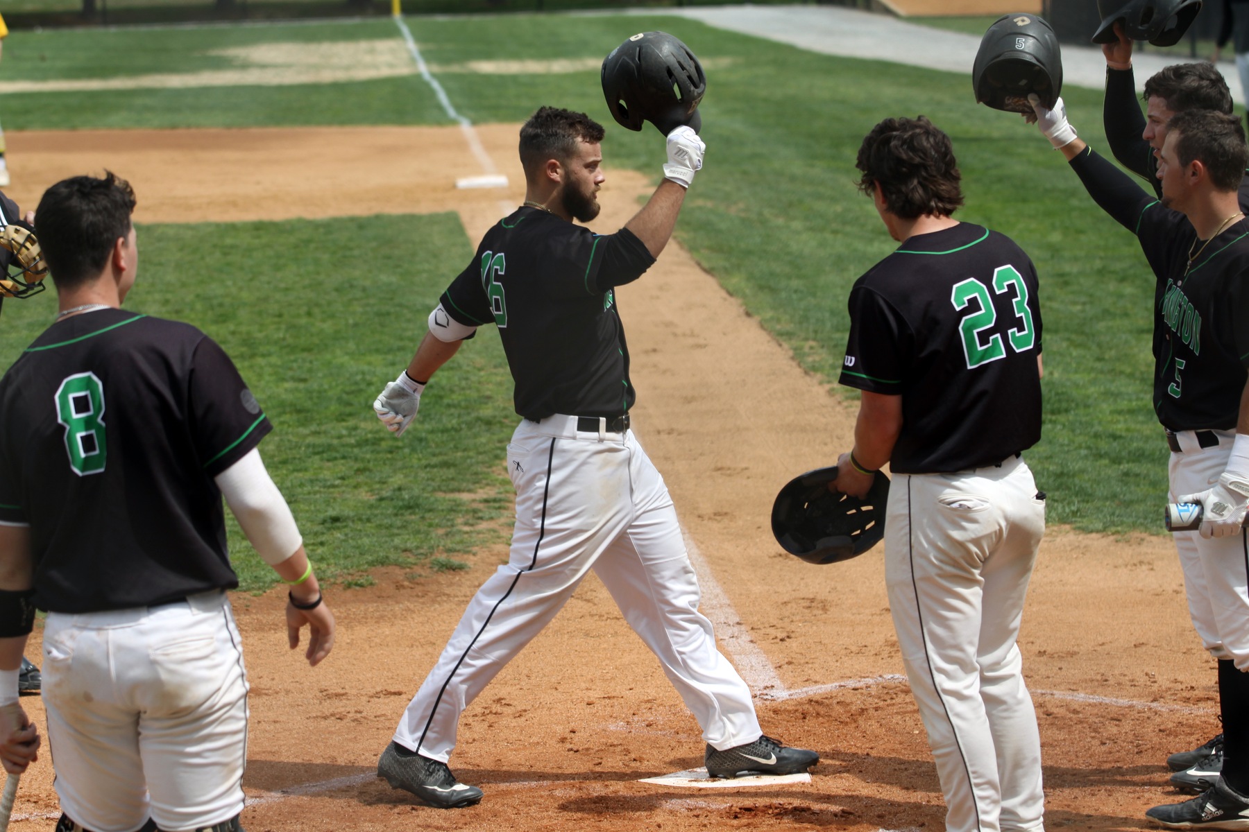Copyright 2019; Wilmington University. All rights reserved. Photo of Brooks Ryan crossing the plate after his three-run homer in the first in game one against Felician. Photo by Katlynne Tubo. April 12, 2019 vs. Felician.