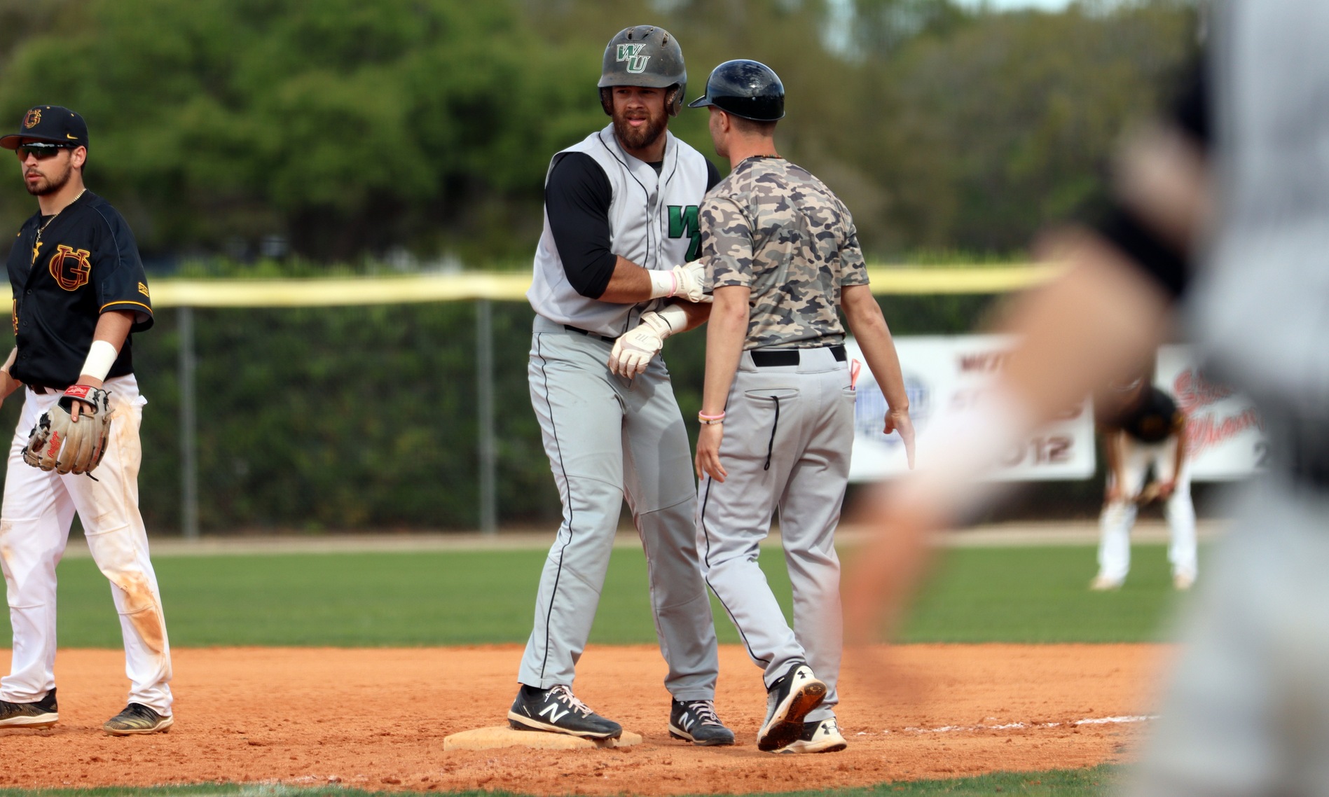 Photo of Brooks Ryan knocking in the go-ahead run in the eighth inning against Gannon. Copyright 2020; Wilmington University. All rights reserved. Photo by Dan Lauletta. March 6, 2020 vs. Gannon at Bing Tyus Yard in Winter Haven, Fla.