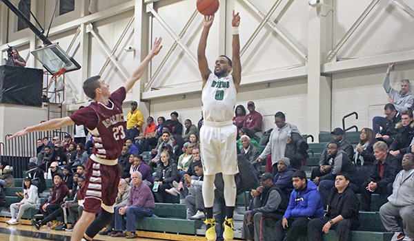 Copyright 2017; Wilmington University. All rights reserved. Photo of Drew Johnson II knocking down one of his six three pointers against USciences, taken by Frank Stallworth.