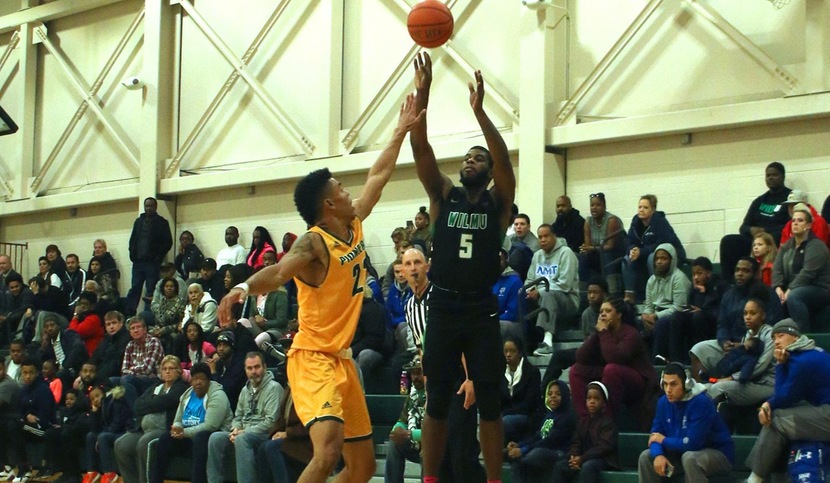 Copyright 2017; Wilmington University. All rights reserved. Photo of Shawn Church hitting one of his five three-pointers, by Frank Stallworth. November 11, 2017 vs. LIU Post.
