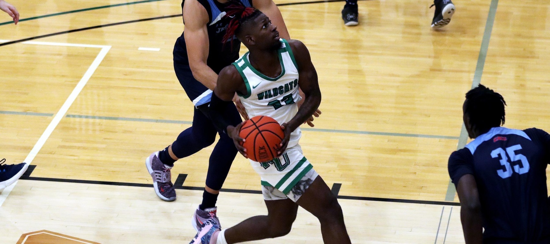 Photo of Amiri Stewart who scored eight points and had four rebounds while playing tenacious defense against Jefferson. Copyright 2022; Wilmington University. All rights reserved. Photo by Dan Lauletta. December 6, 2022 vs. Jefferson.