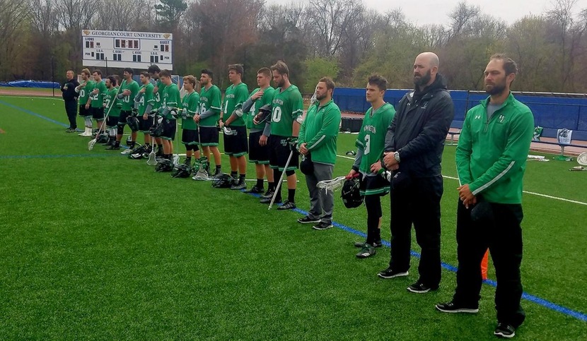 Copyright 2018; Wilmington University. All rights reserved. Photo of the team during the National Anthem prior to their CACC Semifinal game at Georgian Court. April 27, 2018.