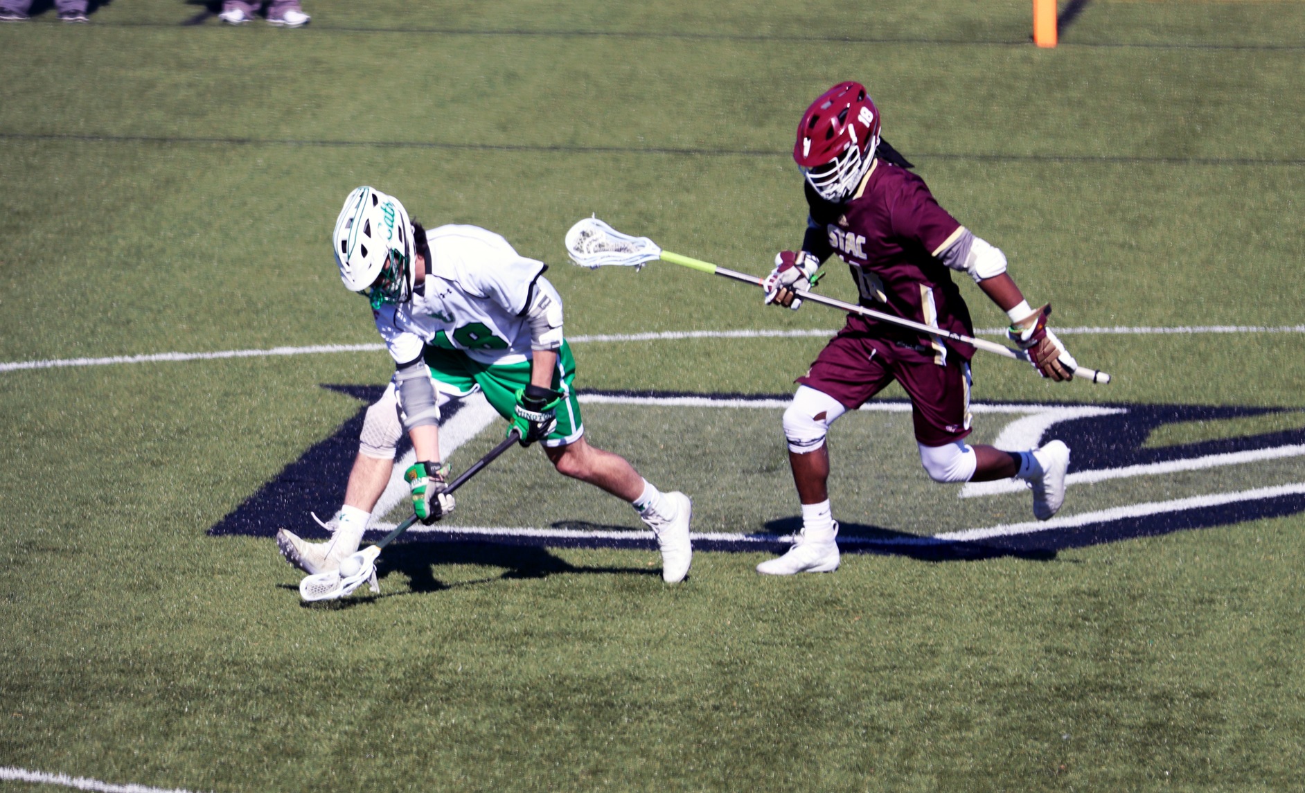 Photo of Anton Mackey winning one of his 22 faceoffs against the Spartans. Copyright 2020; Wilmington University. All rights reserved. Photo by Dan Lauletta. Saturday, March 7, 2020 vs. St. Thomas Aquinas.