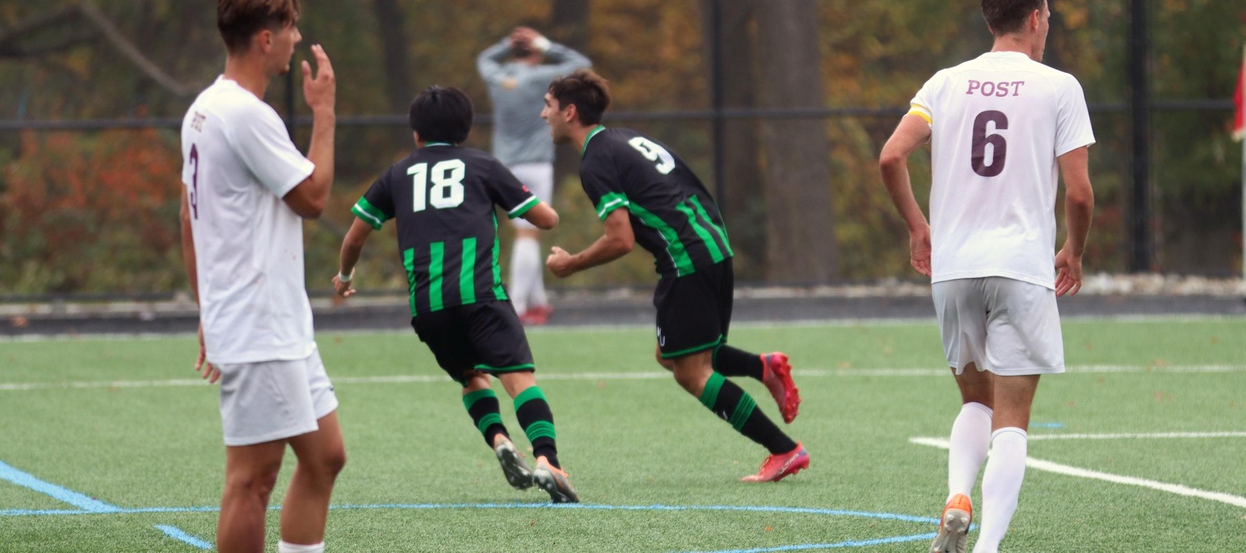 Photo of Pol Romero (9) and Ryuga Uchigashima (18) celebrating Romero's second goal of the first half in the CACC Semifinal. Copyright 2022; Wilmington University. All rights reserved. Photo by Mitchell Coll.