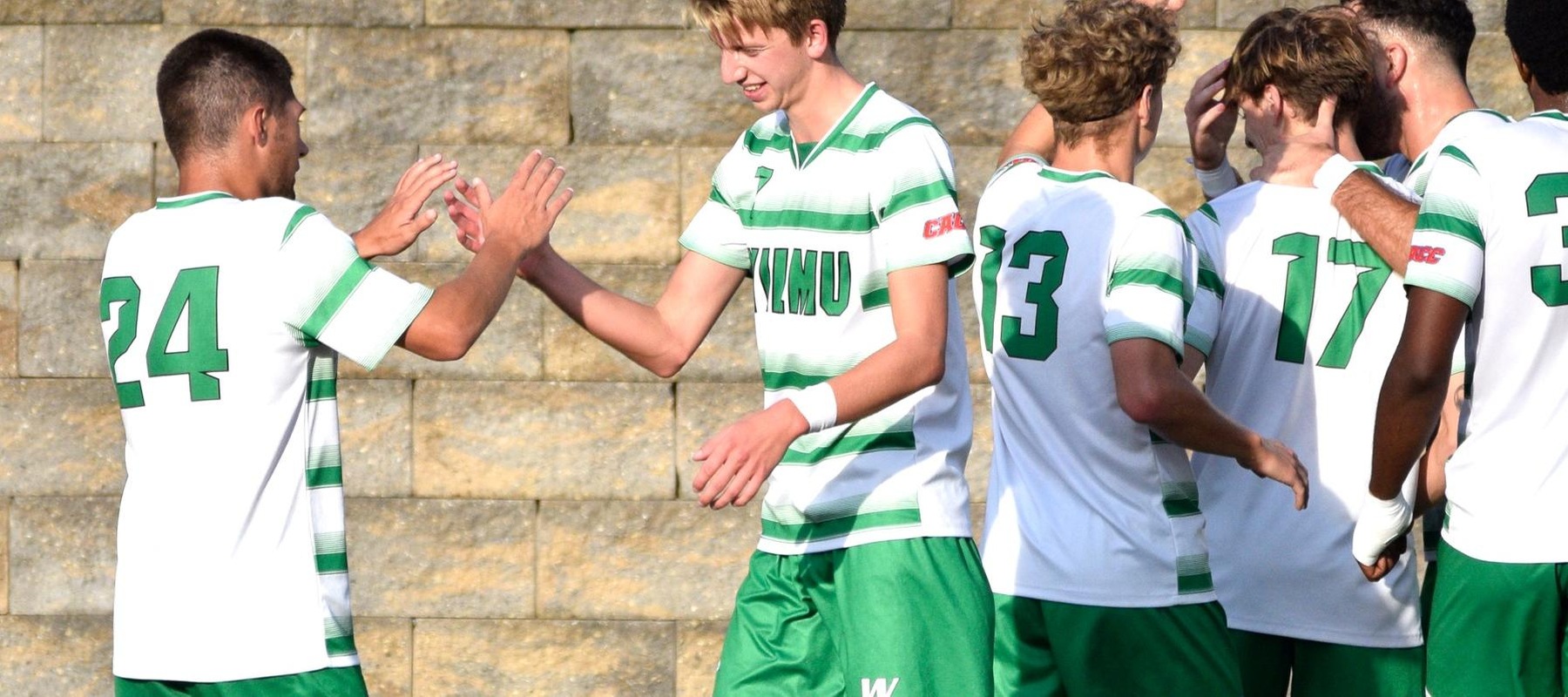 File photo of Tyler Guadagno (24) who scored his first collegiate career goal at Holy Family. Wilmington University players celebrate after winning a goal against West Chester University during their NCAA Mens soccer match at the Wilmington University Sports complex in Newark, Delaware, October 12, 2022. Photo By Amanda Angell