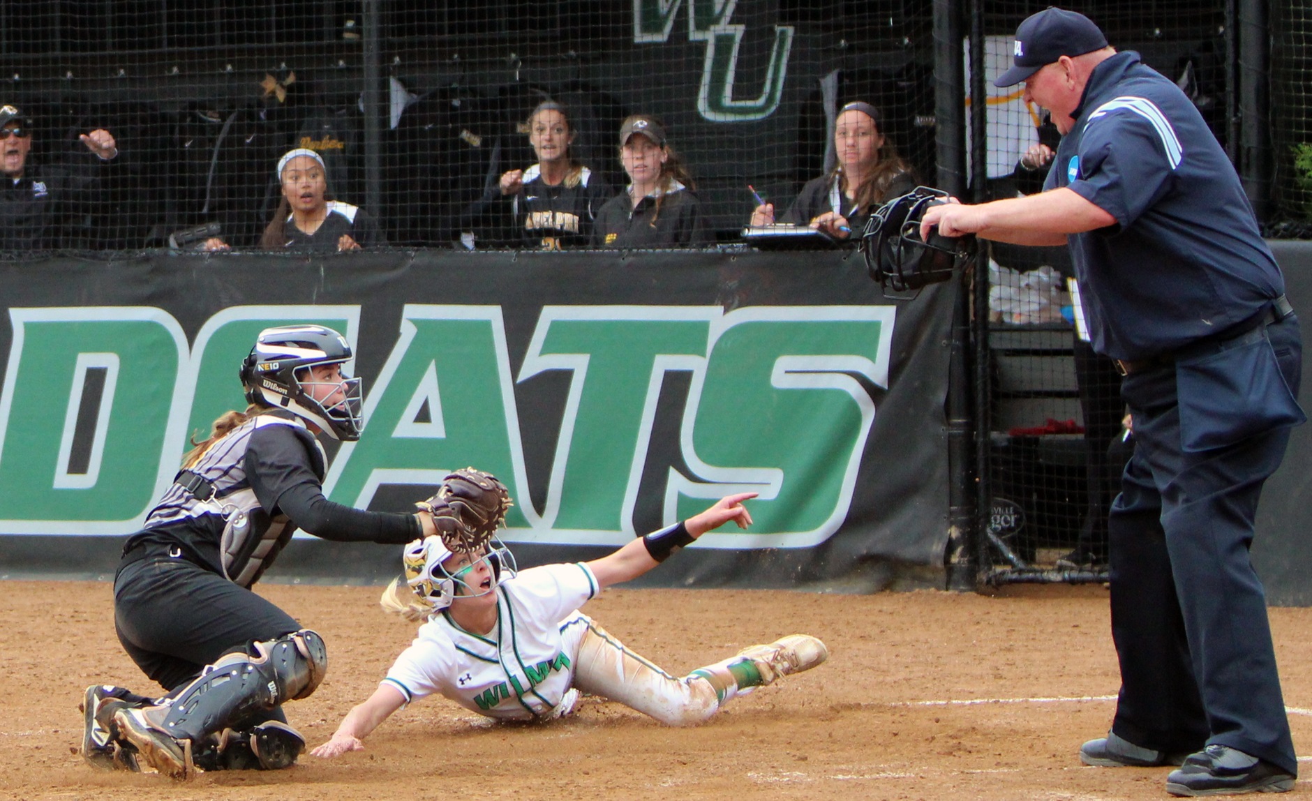 Copyright 2019: Wilmington University. All rights reserved. Photo of Courtney Dellinger scoring the game-tying run in the bottom of the 7th against Adelphi in the Regionals. Photo by Samantha Kelley. May 9, 2019.