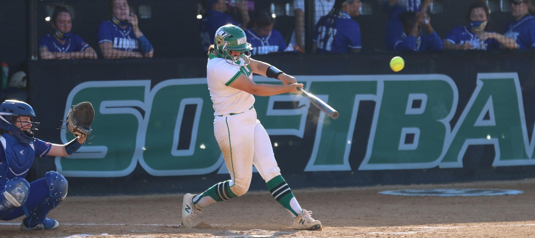 Photo of Lauren Lopez hitting a double in game two against Georgian Court. Copyright 2021; Wilmington University. All rights reserved. Photo by Erin Harvey.
