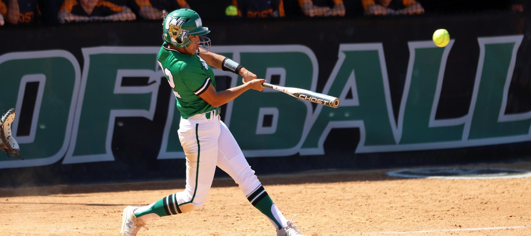Photo of Gabbie Saucedo hitting a triple in game two against Post. Copyright 2022; Wilmington University. All rights reserved. Photo by Dan Lauletta. April 15, 2022 vs. Post.