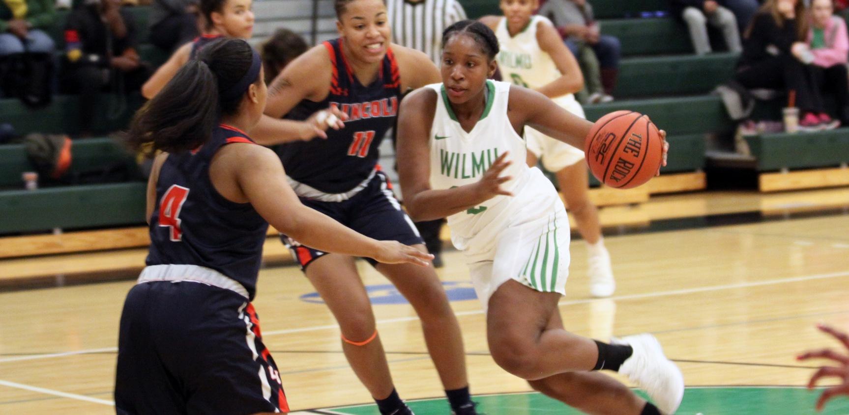 Copyright 2018; Wilmington University. All rights reserved. Senior Nyree Grant drives to the bucket against Lincoln (Pa.). December 31, 2018 vs. Lincoln (Pa.). Photo by Dan Lauletta