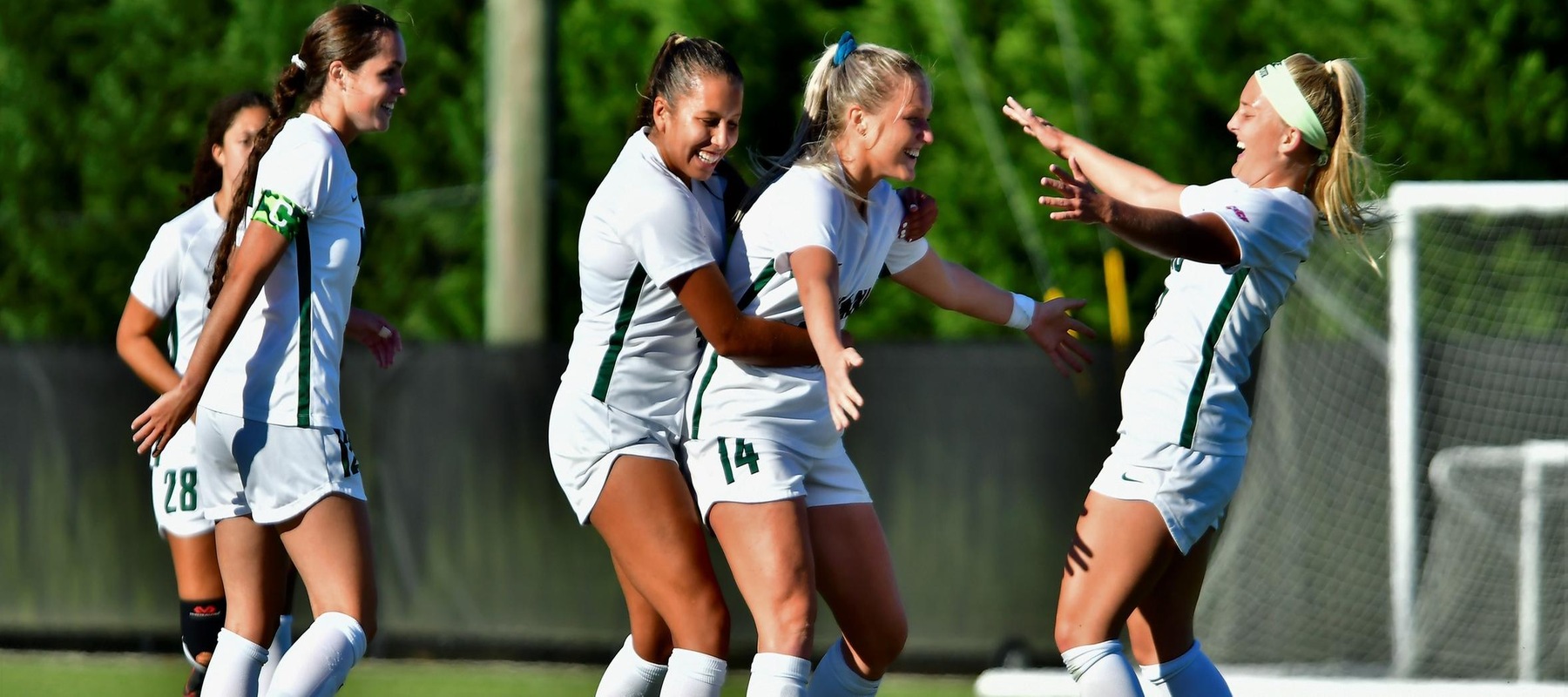 A celebration following Lauren Hoelke's (14) goal to make it 3-1 against GBC. Copyright 2021; Wilmington University. All rights reserved. Photo by James Jones. November 9, 2021 vs. Goldey-Beacom in CACC 1st Round.