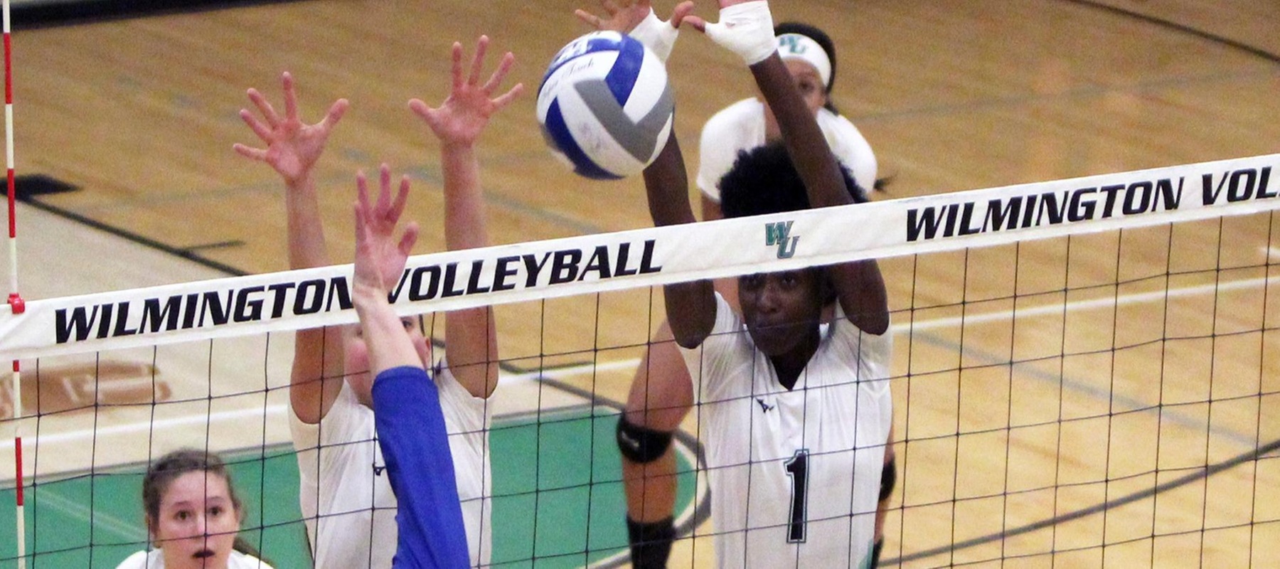 Angel Oliver (1) tied the program mark with 10 block assists against AIC. Copyright 2019; Wilmington University. All rights reserved. Photo by Samantha Kelley. September 26, 2019 vs. Georgian Court.