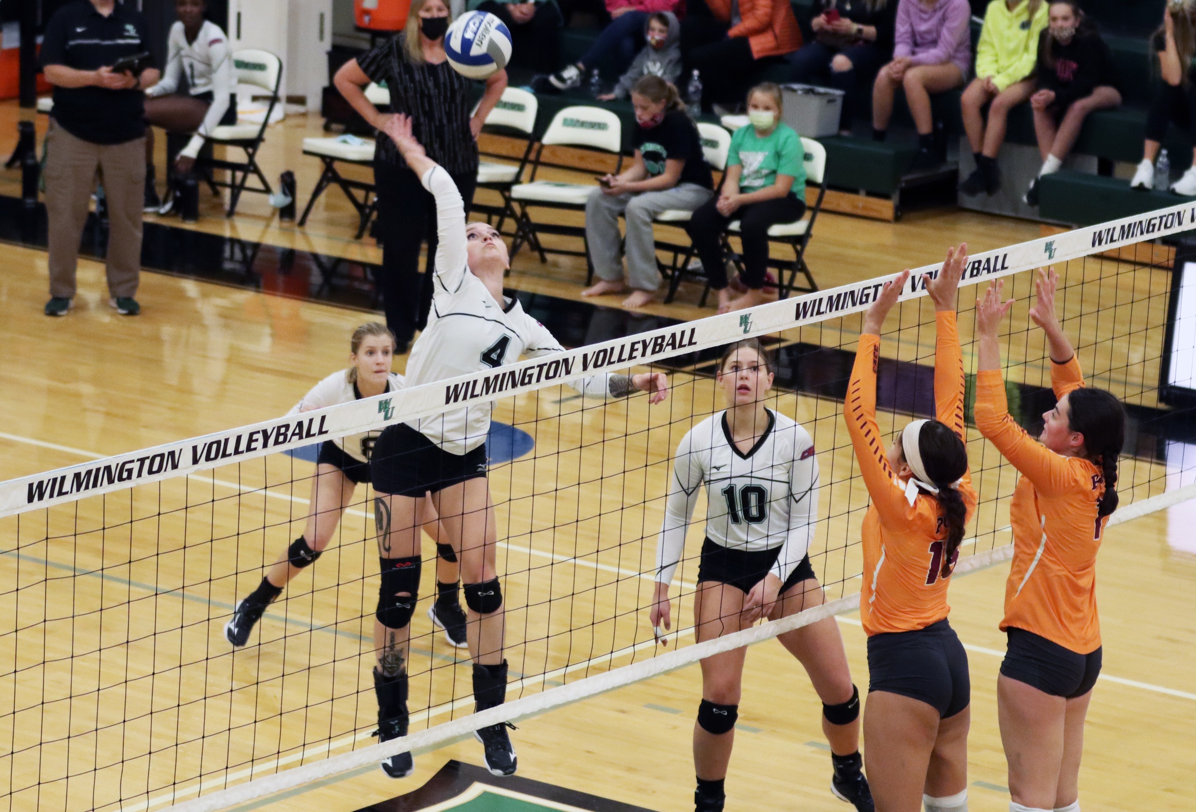 Photo of Mandy Behiels putting down one of her 11 kills against Post. Copyright 2021; Wilmington University. All rights reserved. Photo by Mitchell Coll. November 16 vs. Post in CACC First Round.