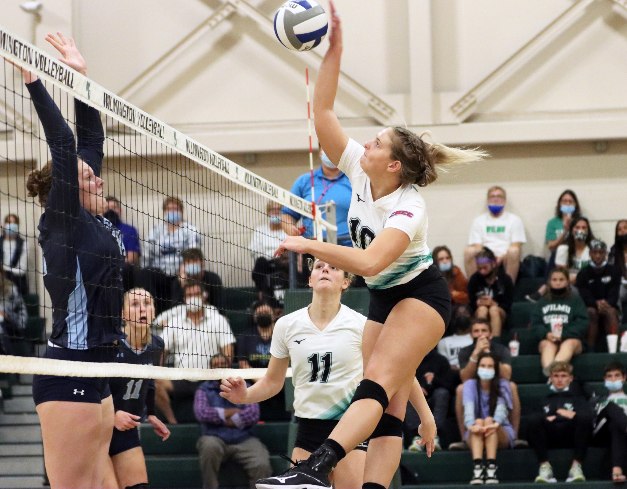 Photo of Dorie Moore putting down a kill against Jefferson. Copyright 2021; Wilmington University. All rights reserved. Photo by Dan Lauletta. October 5, 2021 vs. Jefferson.
