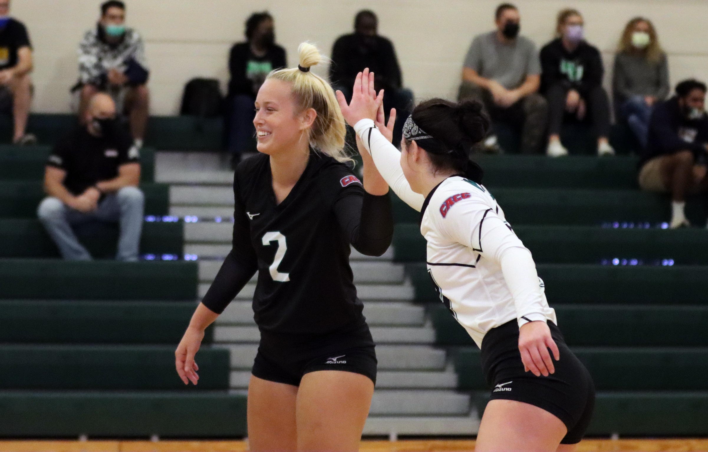 Heather Pedrick (2) and Elly Collins (24). Copyright 2021; Wilmington University. All rights reserved. Photo by Dan Lauletta. October 23, 2021 vs. Caldwell.