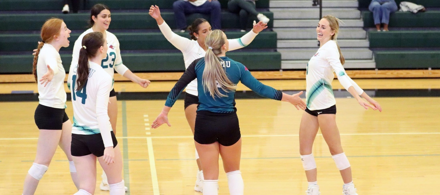 Haley Holland (far rights) picks up one of her five aces against Southern New Hampshire on Friday morning. Copyright 2024; Wilmington University. All rights reserved. Photo by Dan Lauletta.